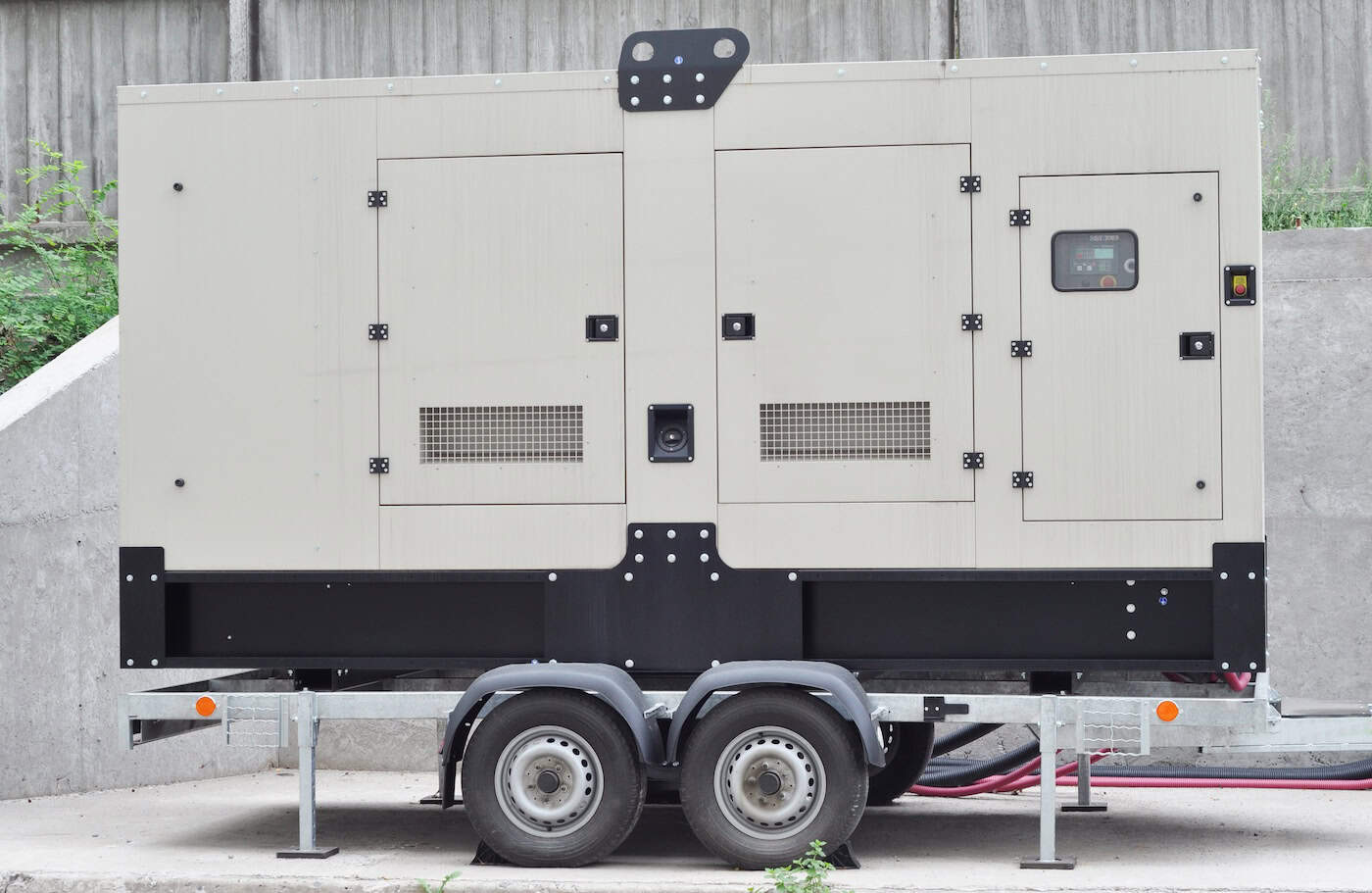 A Close Up Of A Quiet Towable, Standalone Emergency Gaseous Generator. A Mobile Trailer Mounted Natural Gas Generator Is Providing Transportable Power To The Construction, Industrial Applications.