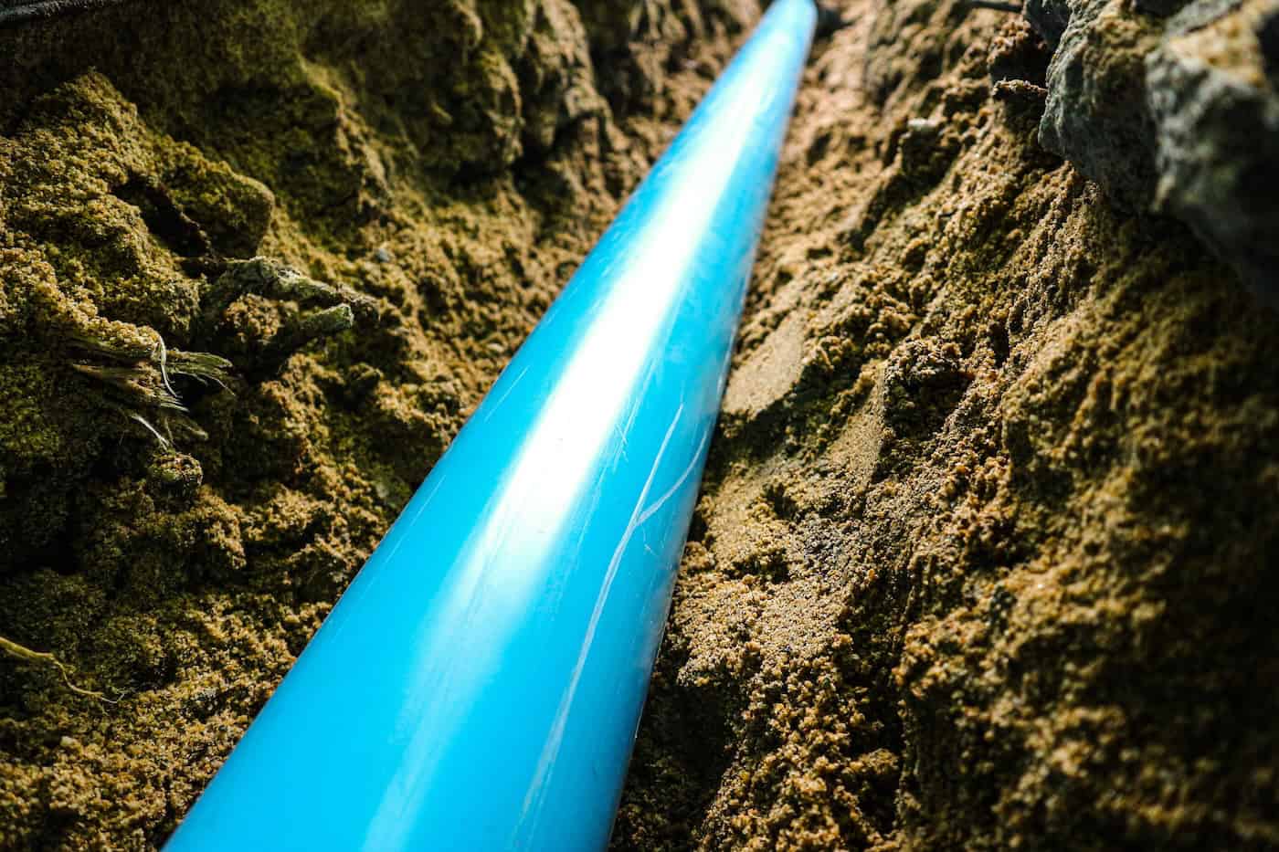 Close Up Pvc Pipe Under Backfilling Ground