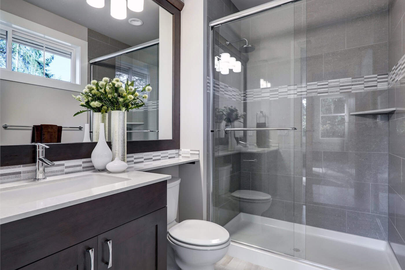 Bright New Bathroom Interior With Glass Walk In Shower