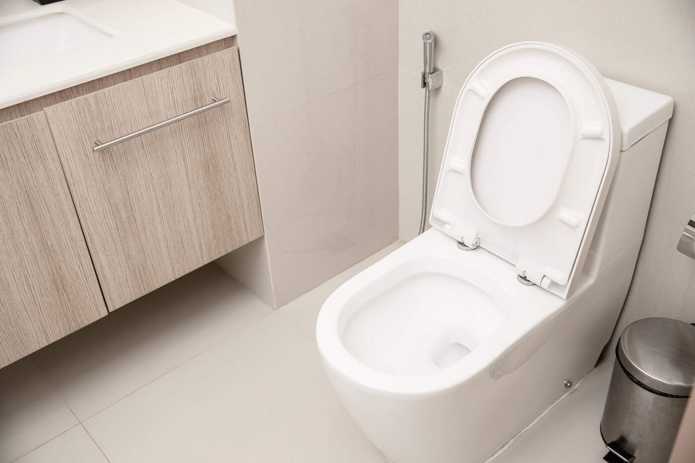 Clean Toilet Bowl In Hotel Bathroom Interior Decoration
