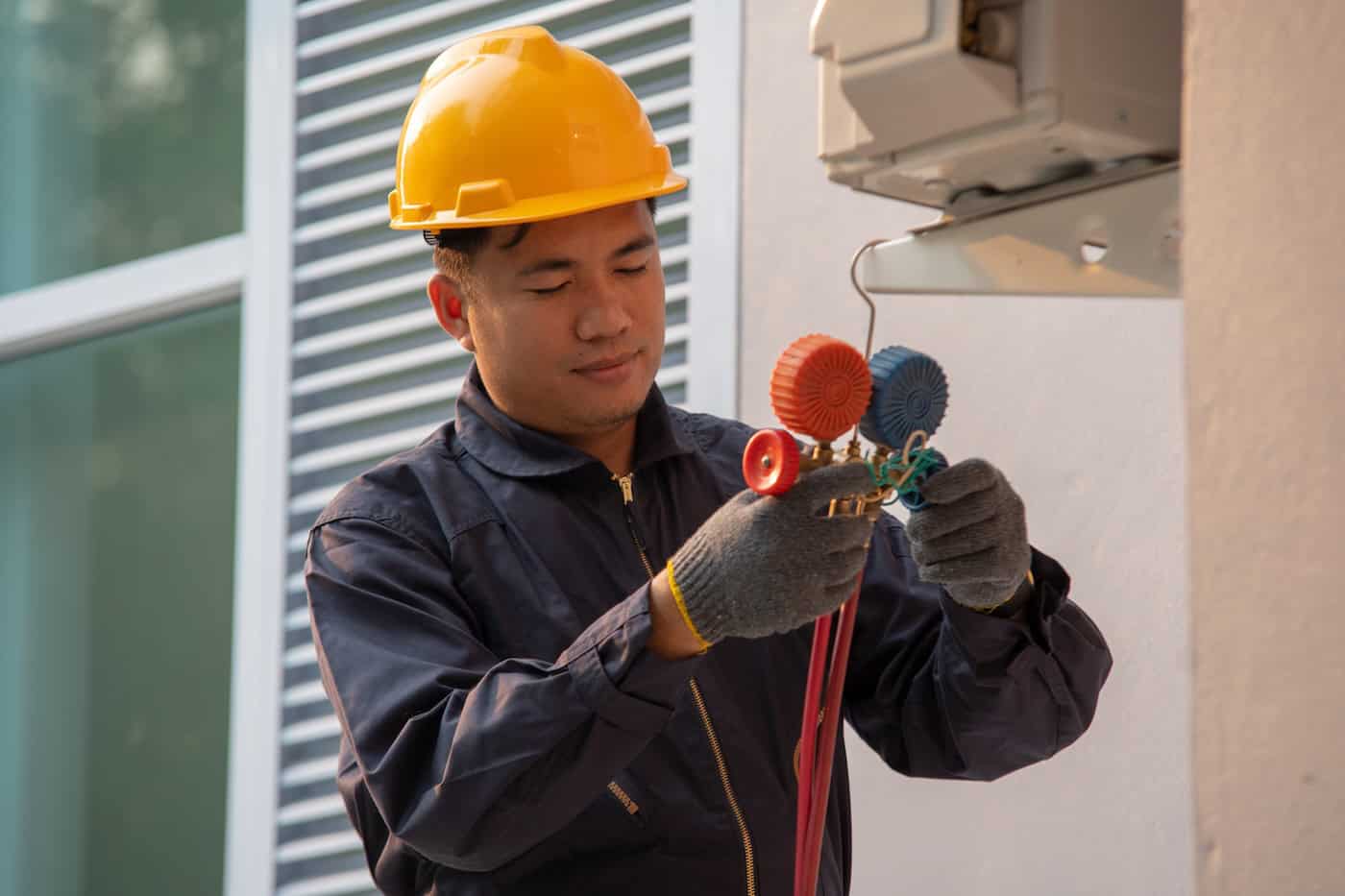 Technician Are Checking Outdoor Air Conditioner Unit,measuring Equipment For Filling Air Conditioners.