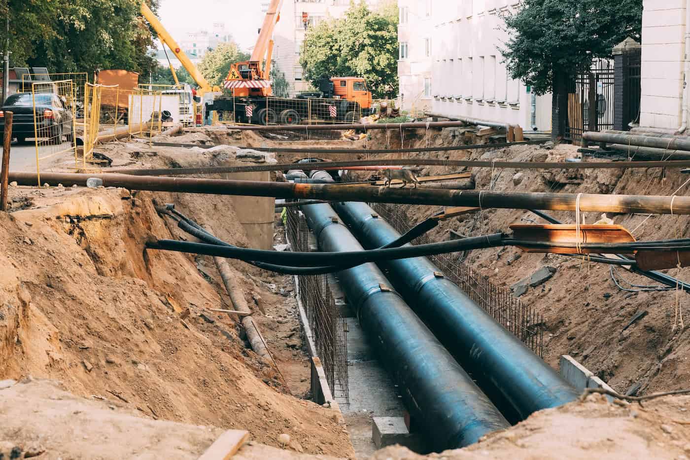 Work Area Road Repair, Sewer Repairs. Tubes Ground. Maintenance Area In City Street. Repair Communications