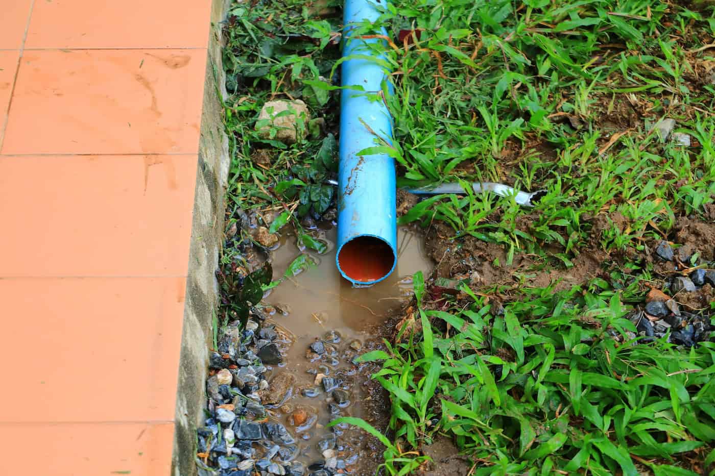 Pvc Plastic Pipe Repair Cut Outside A Building Site.