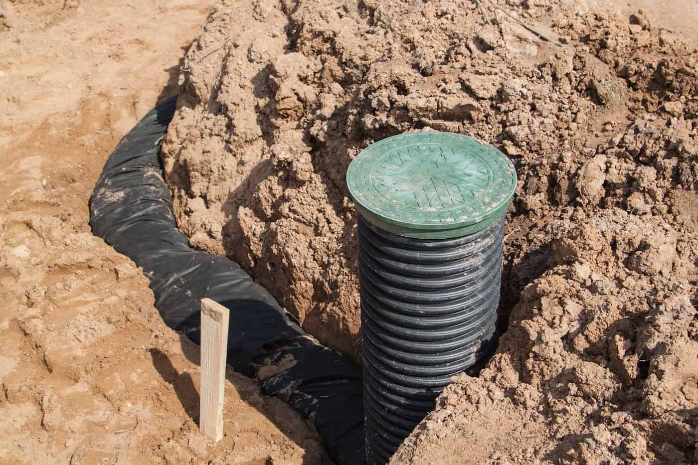 View Of Drainage Pipes And Inspection Well For Removal Of Water From A Site Under Construction Of The House