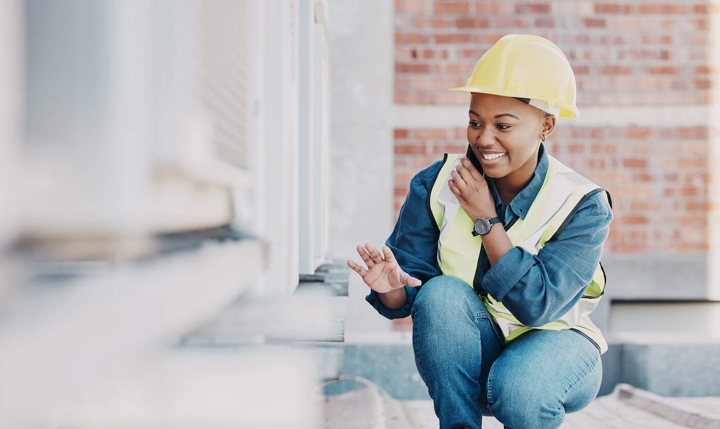 Happy Phone Call, Air Conditioner Or Maintenance Black Woman Chat About Hvac Machine, Heat Pump Or Aircon Inspection. Construction Worker, Cellphone Or Rooftop Technician Person For Ac Repair Service