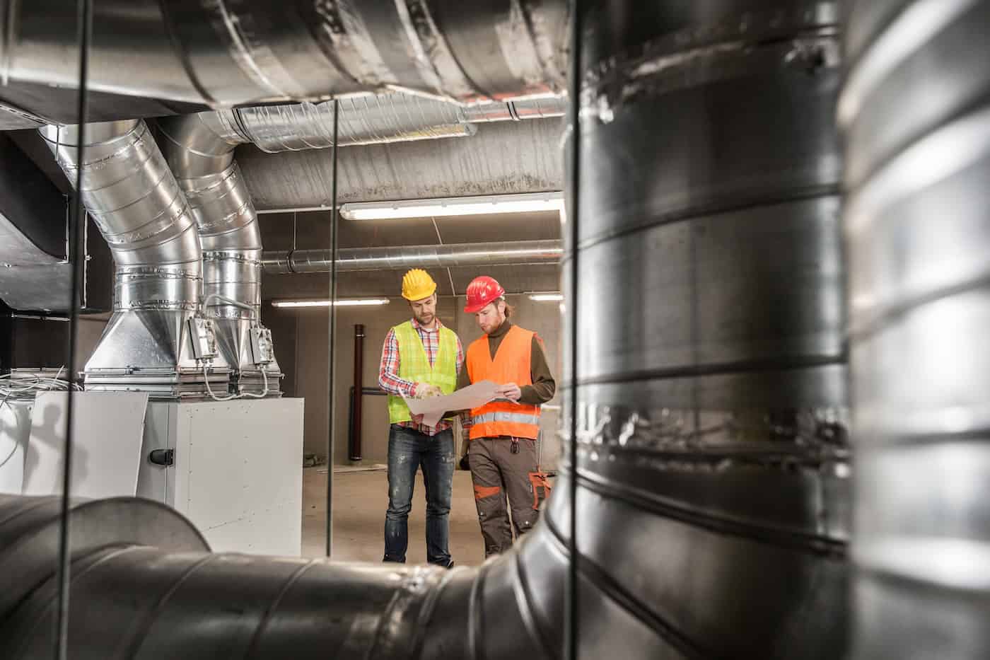 Workers Making Final Touches To Hvac System. Hvac System Stands For Heating, Ventilation And Air Conditioning Technology. Team Work, Hvac, Indoor Environmental Comfort Concept Photo.