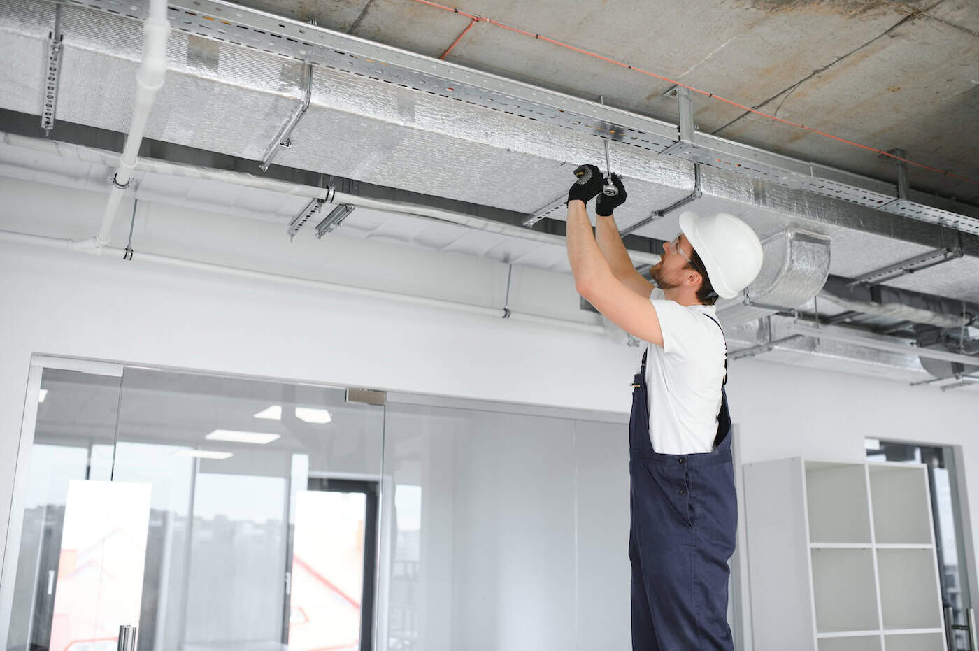 Ventilation System Installation And Repair Service. Hvac Technician At Work. Banner Copy Space