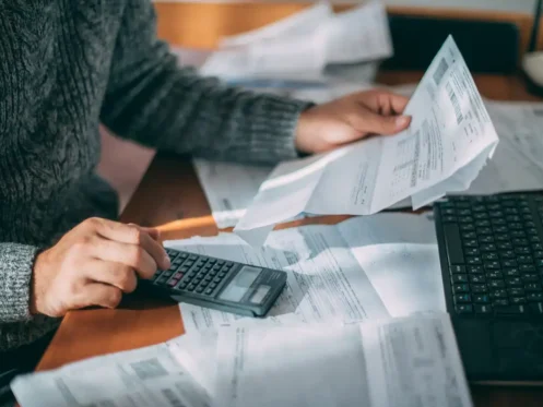 Homeowner paying their bills