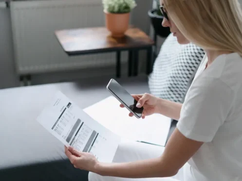 how-to-save-on-water-bill-woman-with-statement