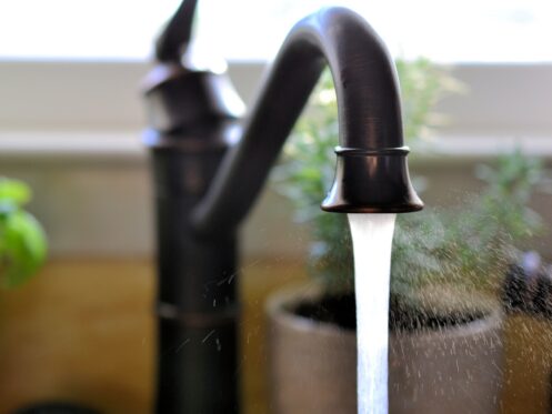 Kitchen sink pouring water