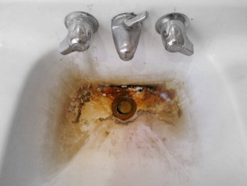Sink badly stained by rust
