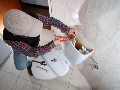worker-fixing-toilet-leak-1-2048x1365